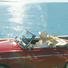海岸線を走るオープンカー